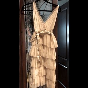 Fun champagne ruffle dress.